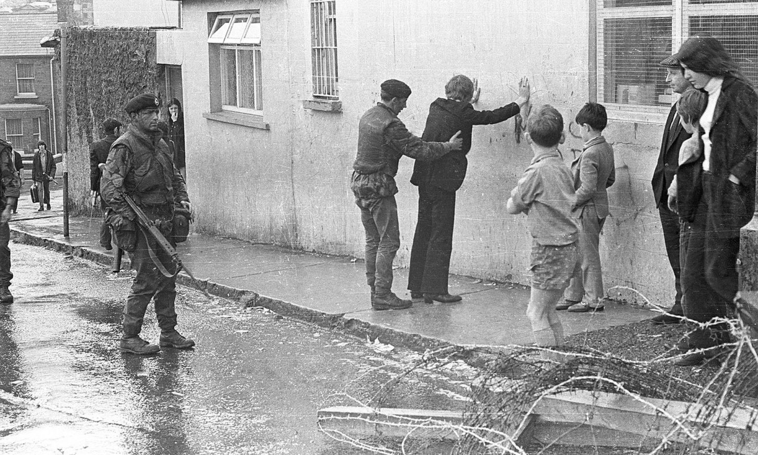 British soldiers performing a stop and search in Derry, circa 1972. Credit: Eamon Melaugh