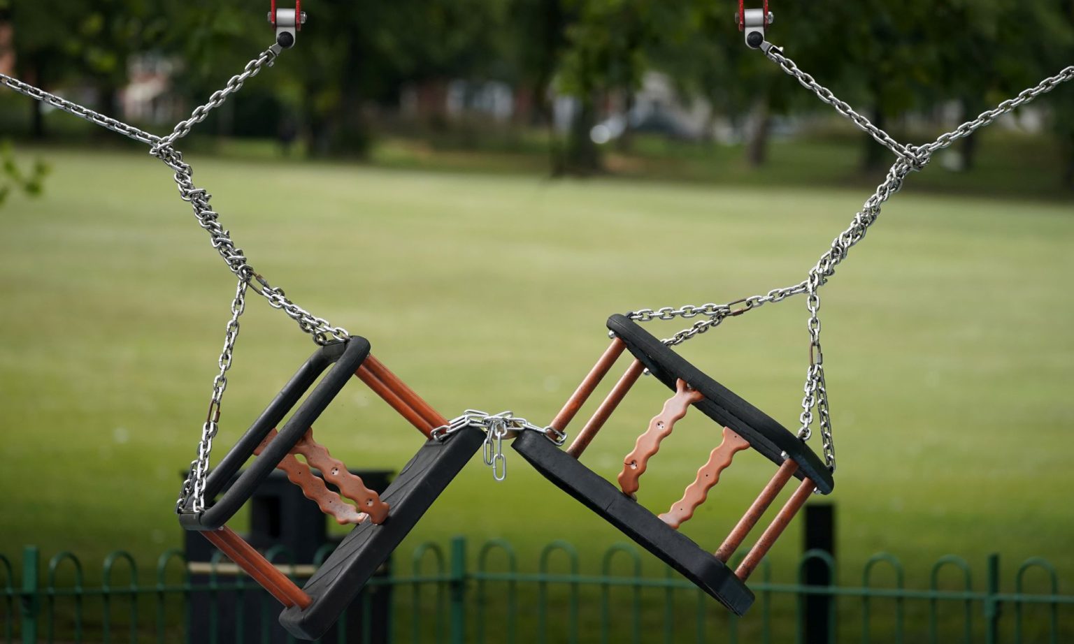 Children's play swings locked and chained in Leicester, England, 30 June 2020.