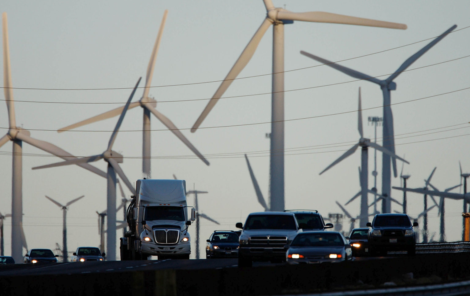 Trucks and cars pass windmills along the 10 freeway, near Banning, California, on 8 December 2009.