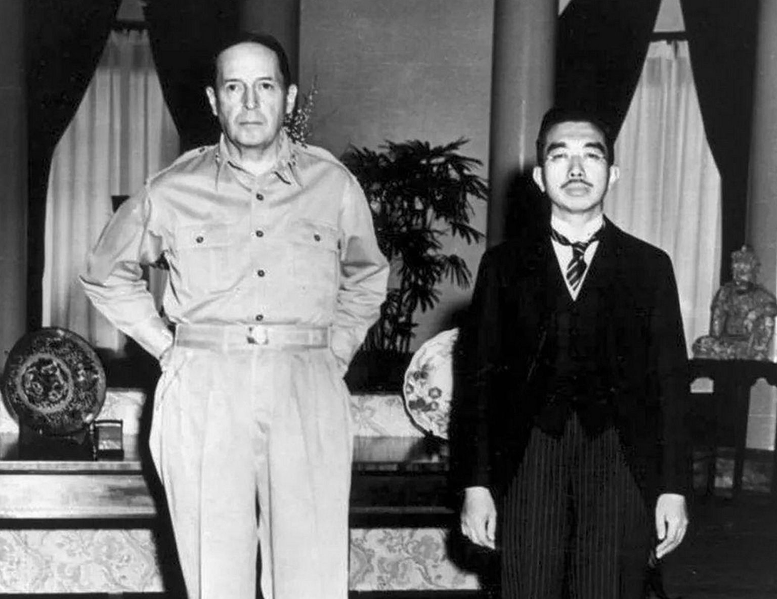 General MacArthur and Emperor Hirohito meet for the first time, at the US. Embassy, Tokyo, on 27 September 1945.