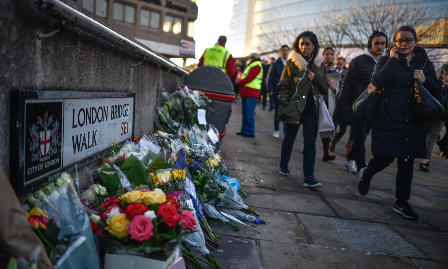 Floral tributes are left for Jack Merritt and Saskia Jones, who were killed in the London Bridge terror attack, 2 December 2019, London, England.