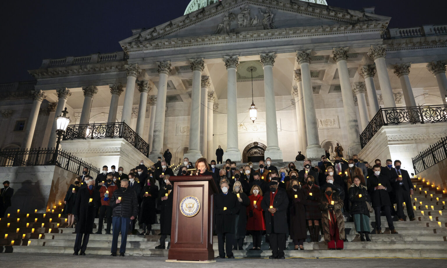Speaker of the House Nancy Pelosi attends a vigil commemorating the anniversary of the Capitol riot, 6 January 2022.