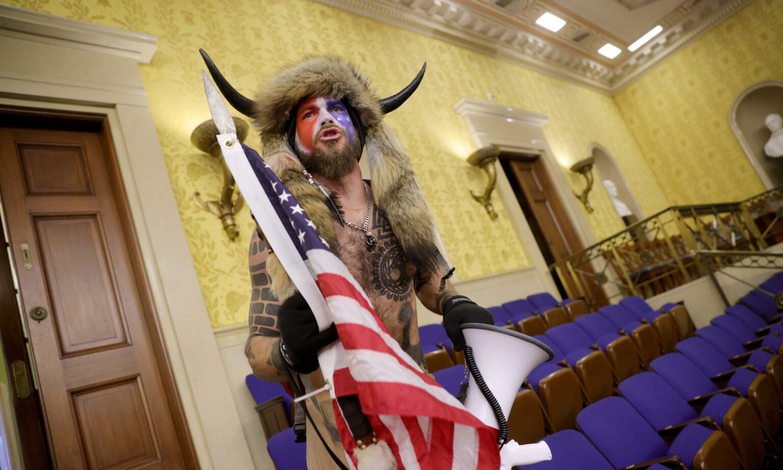 A Trump supporter inside the Capitol, 6 January 2021.