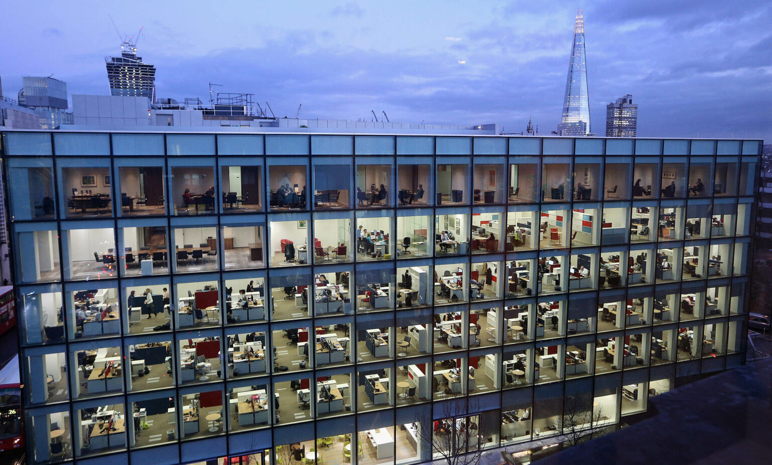People at work in a modern office development, near St Paul's Cathedral, London, 6 February 2013.
