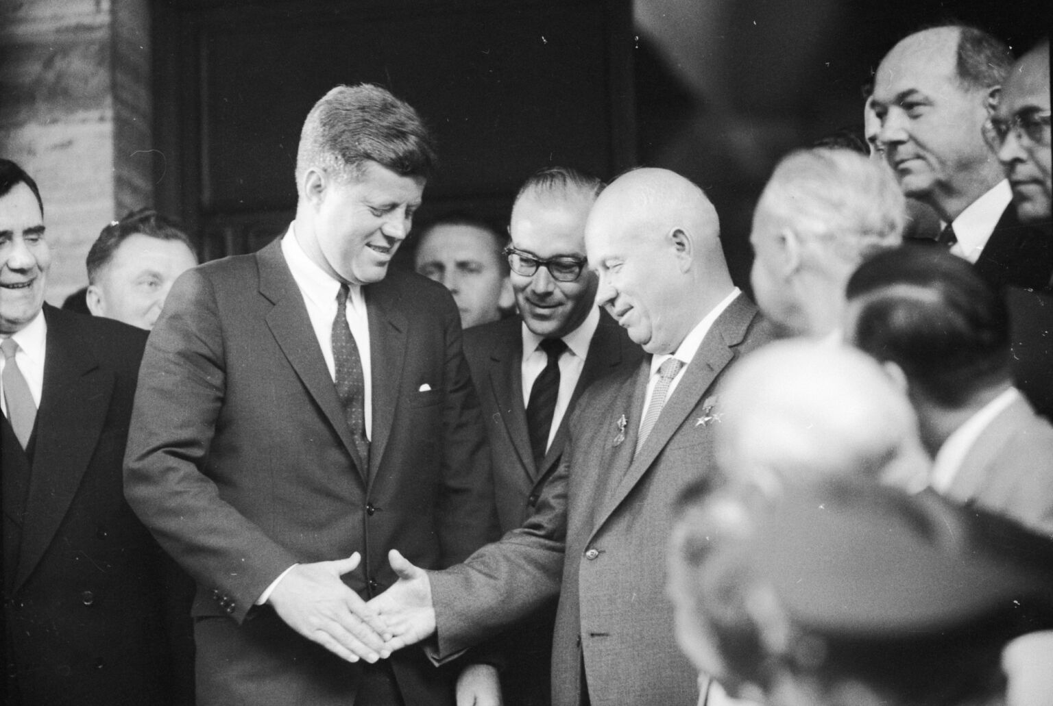 Nikita Khrushchev and John F Kennedy shake hands at the US Embassy in Vienna on meeting for talks, 1961.