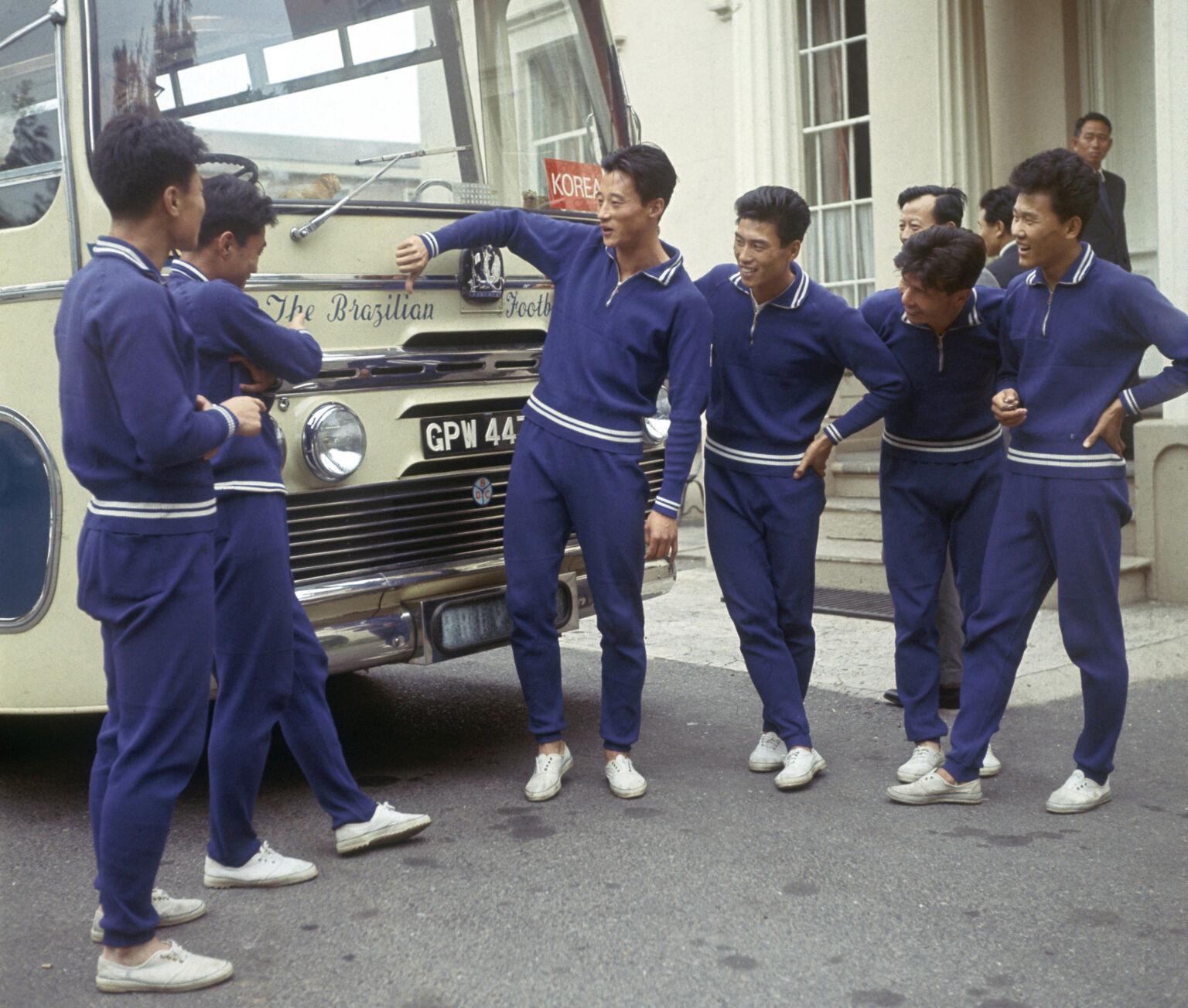 Several North Korean players stand in front of their team bus during the 1966 World Cup, July 1966.