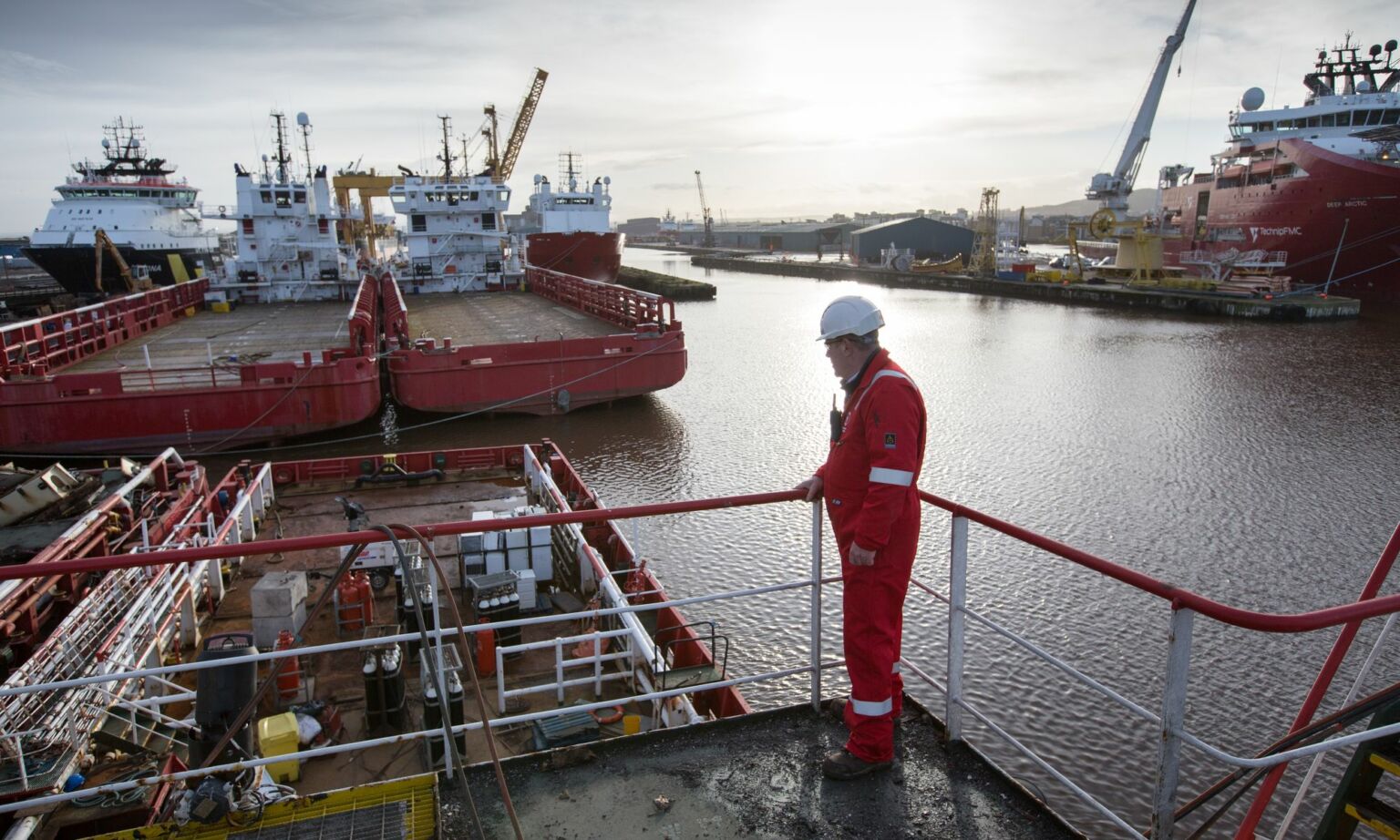 A workman looks out over a decommissioned ship on 25 January, 2018 in Leith, Scotland, as the Scottish Government announced a fund to deliver the decommissioning of North Sea oil and gas infrastructure.