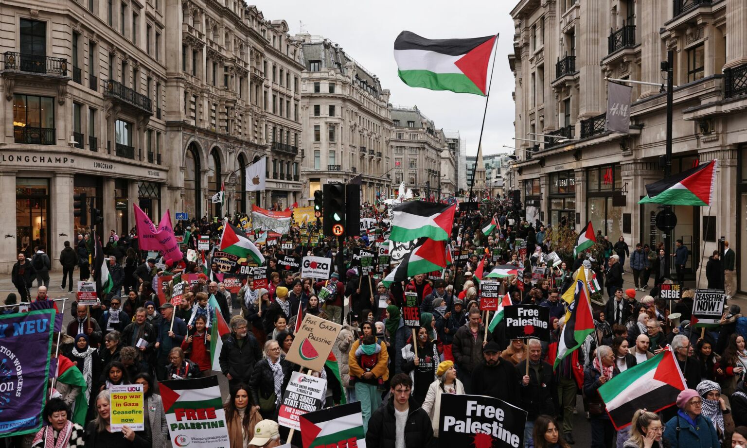 Protestors march down Regent Street during the 'Ceasefire Now Stop The Genocide In Gaza' national UK demonstration on February 3, 2024 in London, England.