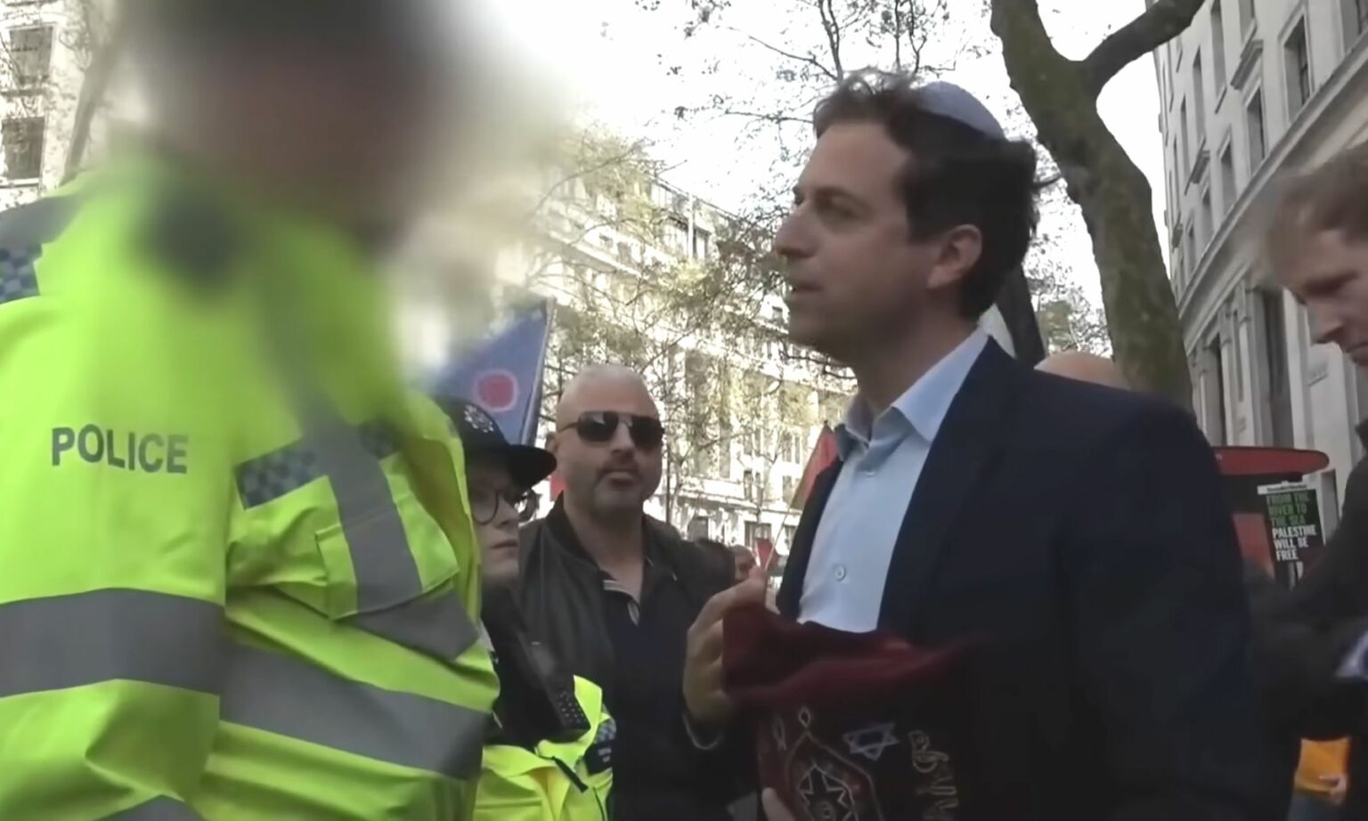 Police talking to Gideon Falter about 'antagonising' pro-Palestine protesters. 