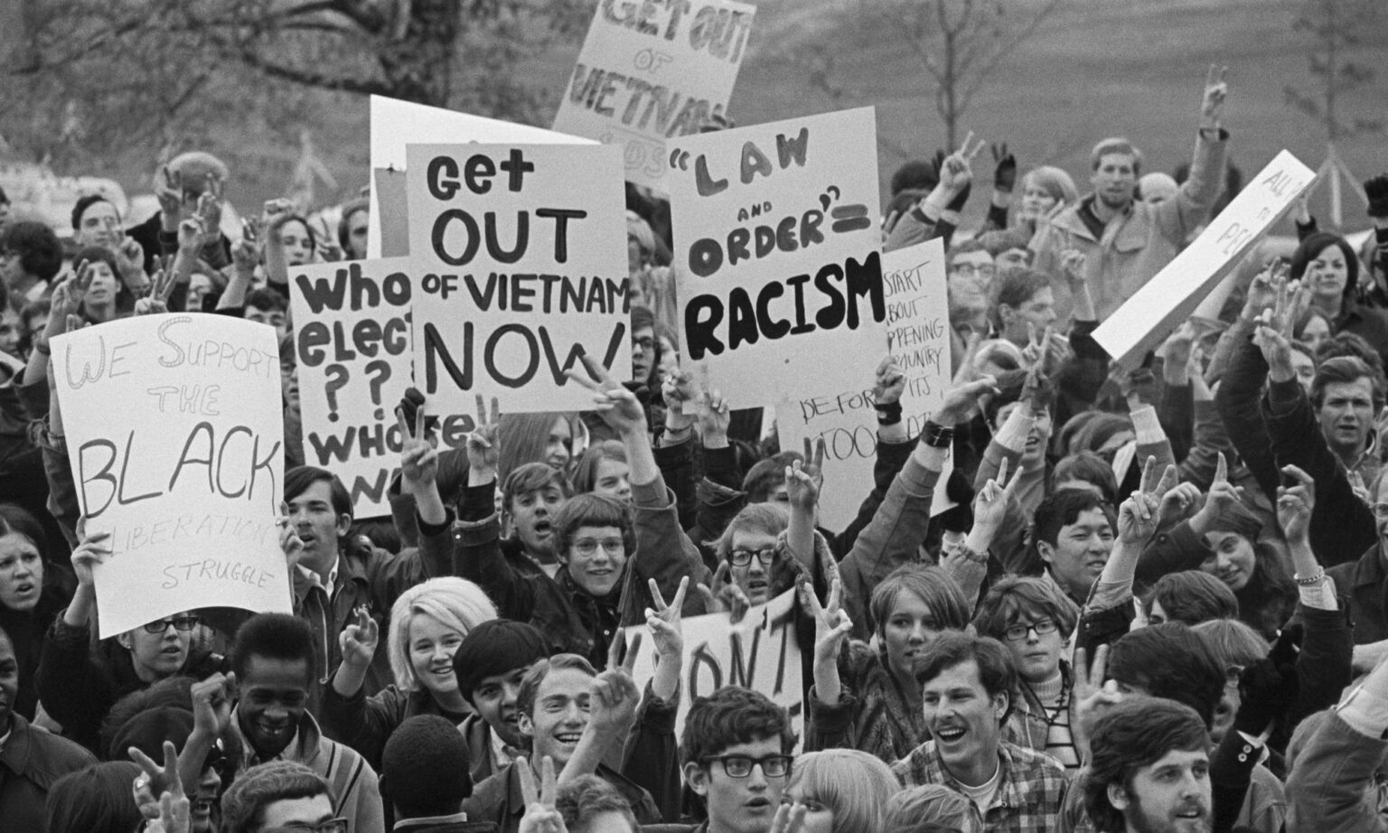 Participants in a Students for a Democratic Society-sponsored demonstration call for peace in Vietnam in Des Moines, Iowa, 1968.