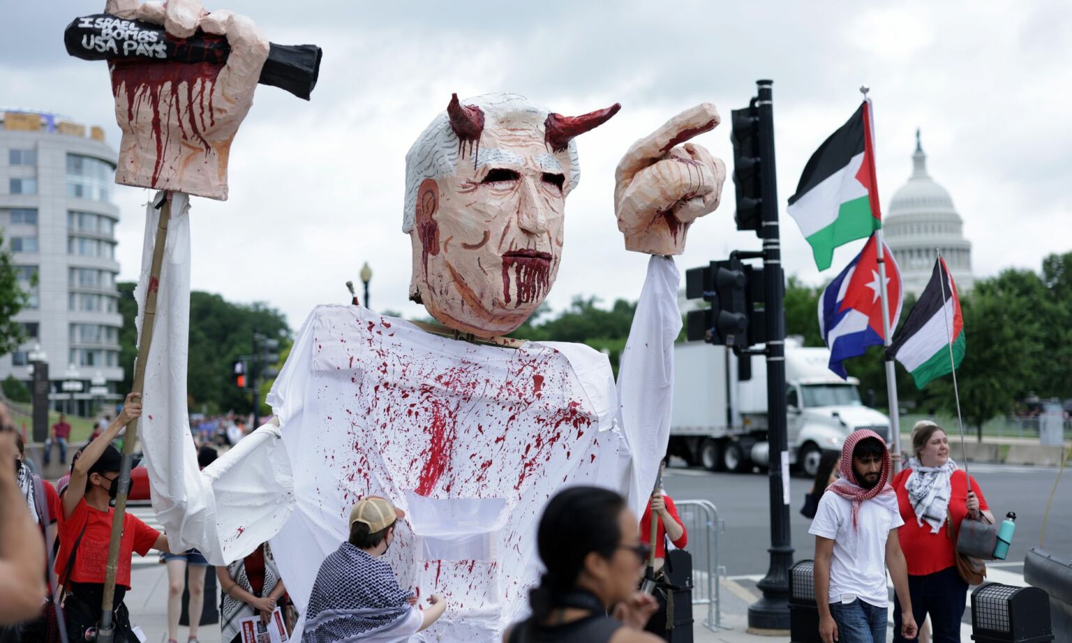Activists carry a puppet of Israeli Prime Minister Benjamin Netanyahu during a protest in Washington, DC, on 24 July 2024.