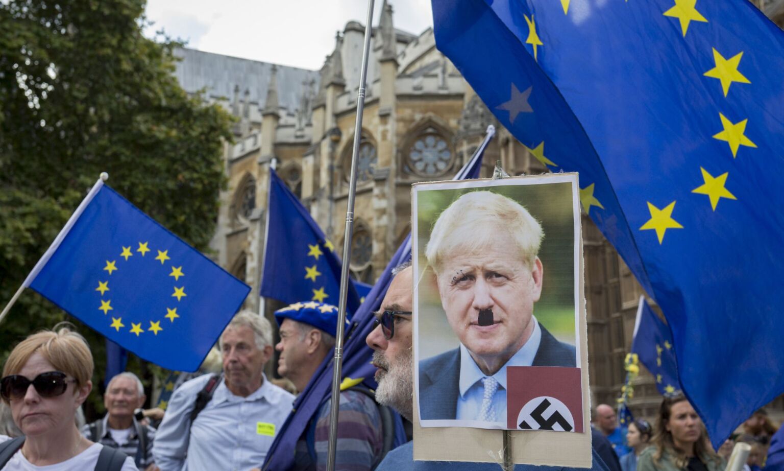 Pro-EU Remainers protest with a picture of Johnson as Hitler outside Parliament, on 3 September 2019, in Westminster, London.