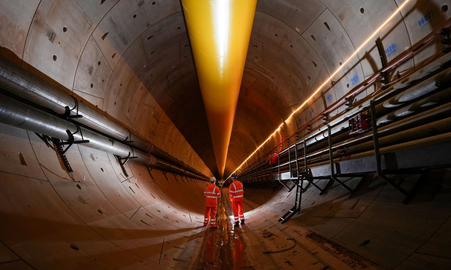 Mining engineers inspect the progress of the Mary Ann tunnel boring machine in the HS2 Bromford Tunnel in Water Orton, England, 2024.
