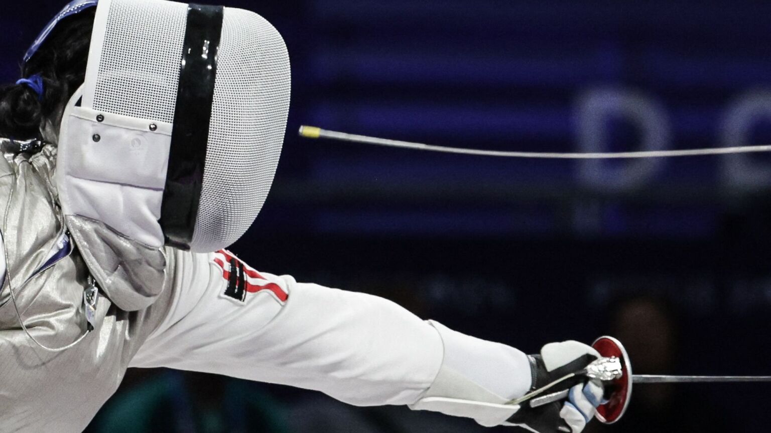 A fencer’s brave protest against men in women’s sports