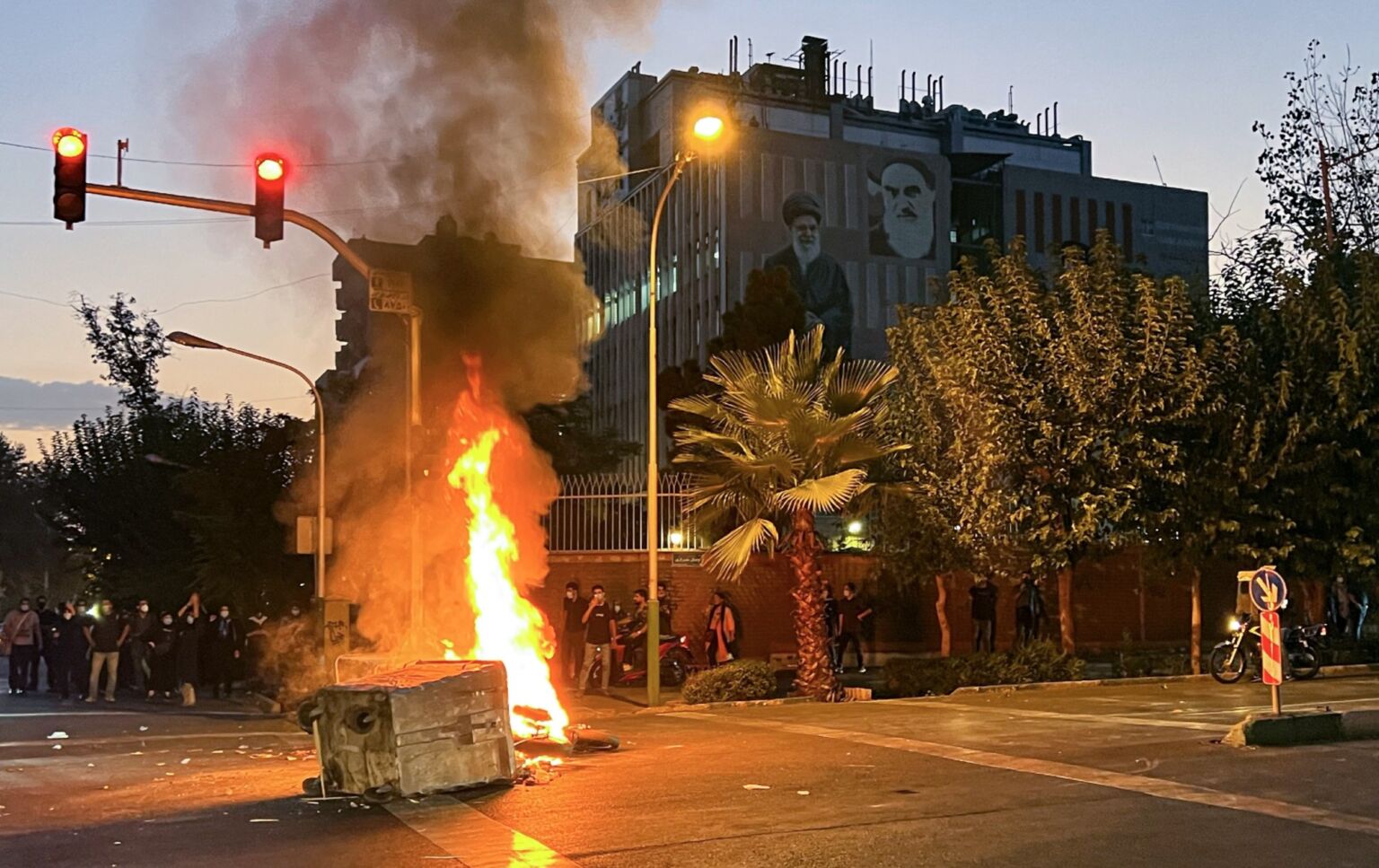Iranians protest for Mahsa Amini, who died after being arrested by morality police, 19 September 2022.