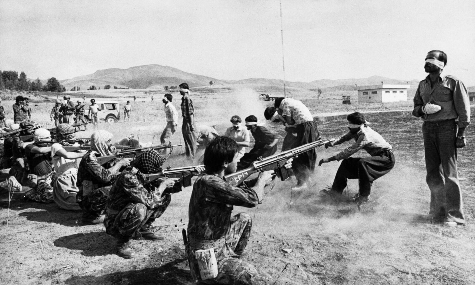 A Islamic Republic firing squad execute nine Kurdish rebels and two former police officers, August, 1979.