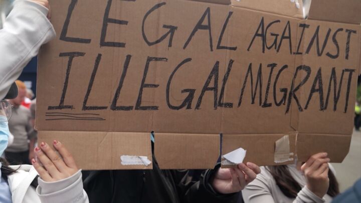 ‘We are legal migrants against illegal immigration’
