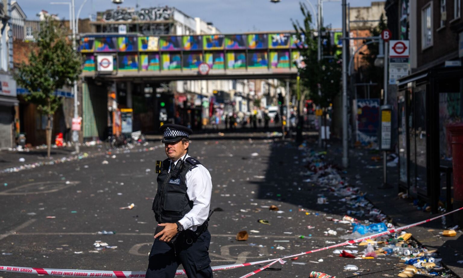 A police officer at the scene of a fatal stabbing during the Notting Hill Carnival, on August 30, 2022. 