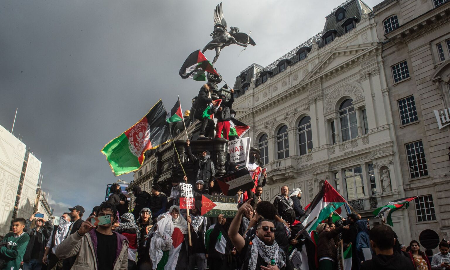 Pro Palestine demonstrators at Piccadilly Circus on October 21, 2023 in London, England.