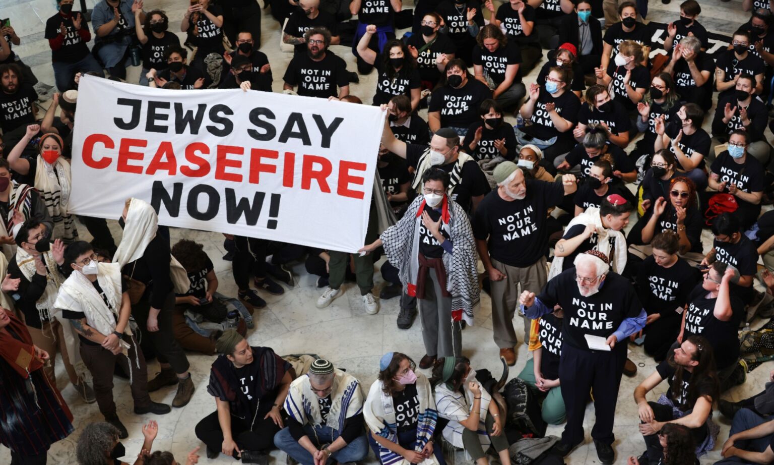 Members of the Jewish Voice for Peace and the IfNotNow movement protesting in the Cannon House Office Building, Washington, DC, 18 October 2023.