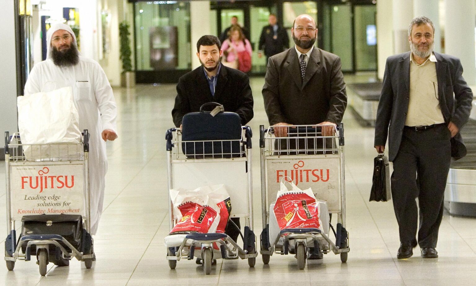 Danish imams Raed Hlayhel, Ahmed Akkari, Abu Bachar and Abu Laban arrive at Copenhagen Airport, 25 March 2006.