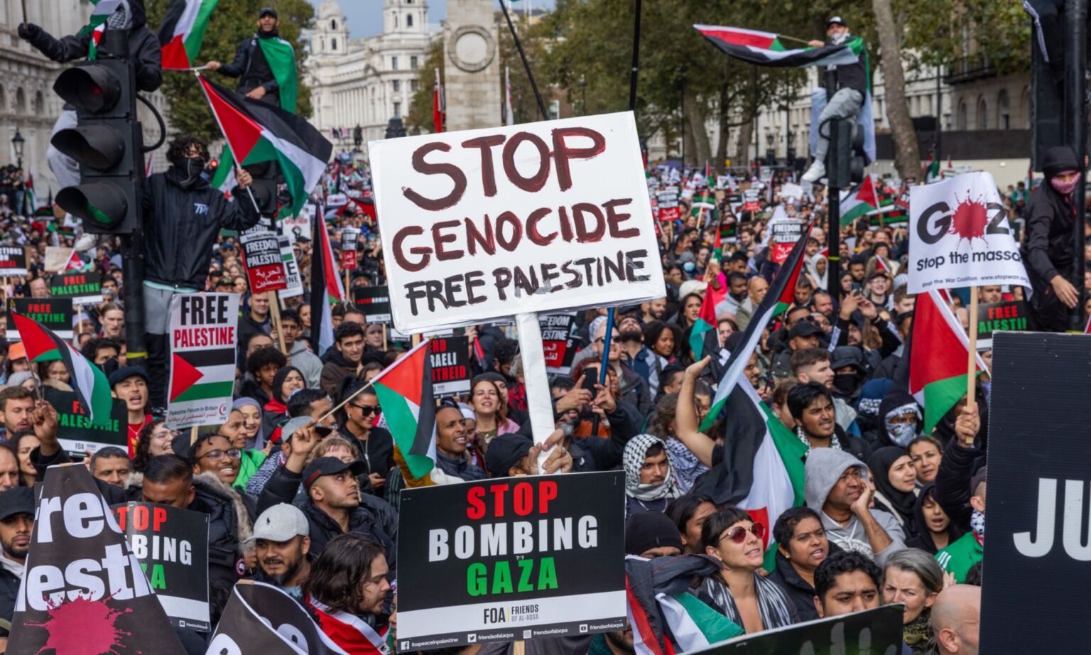 Pro-Palestinian protesters attend a rally close to Downing Street on 21 October 2023.