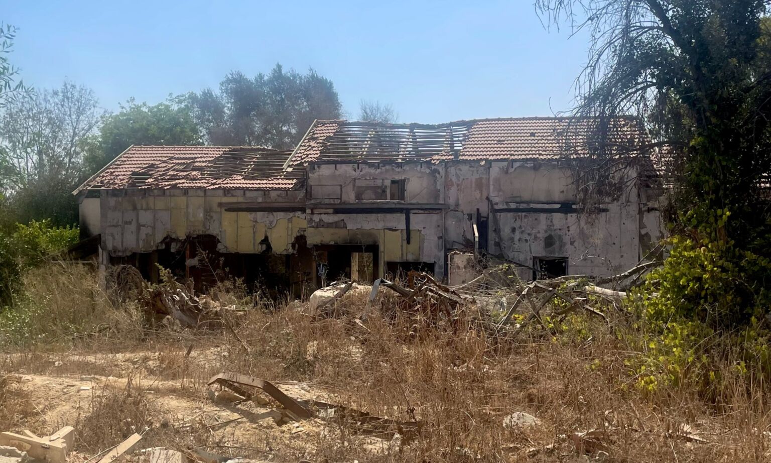 The ruins of a building in Kibbutz Be'eri near the border with Gaza.