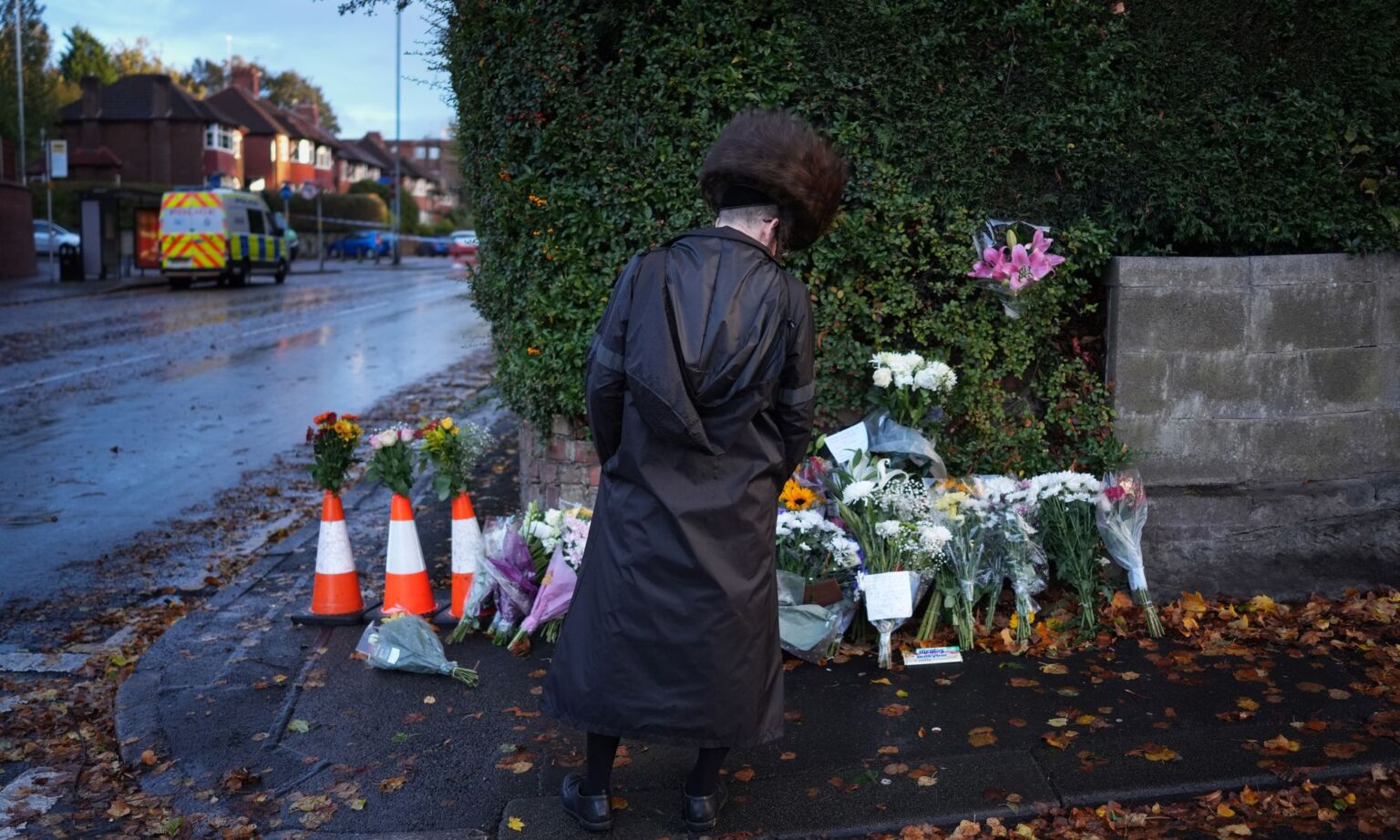 Floral tributes are left near the scene of the terror attack at the Heaton Park synagogue, 4 October 2025.