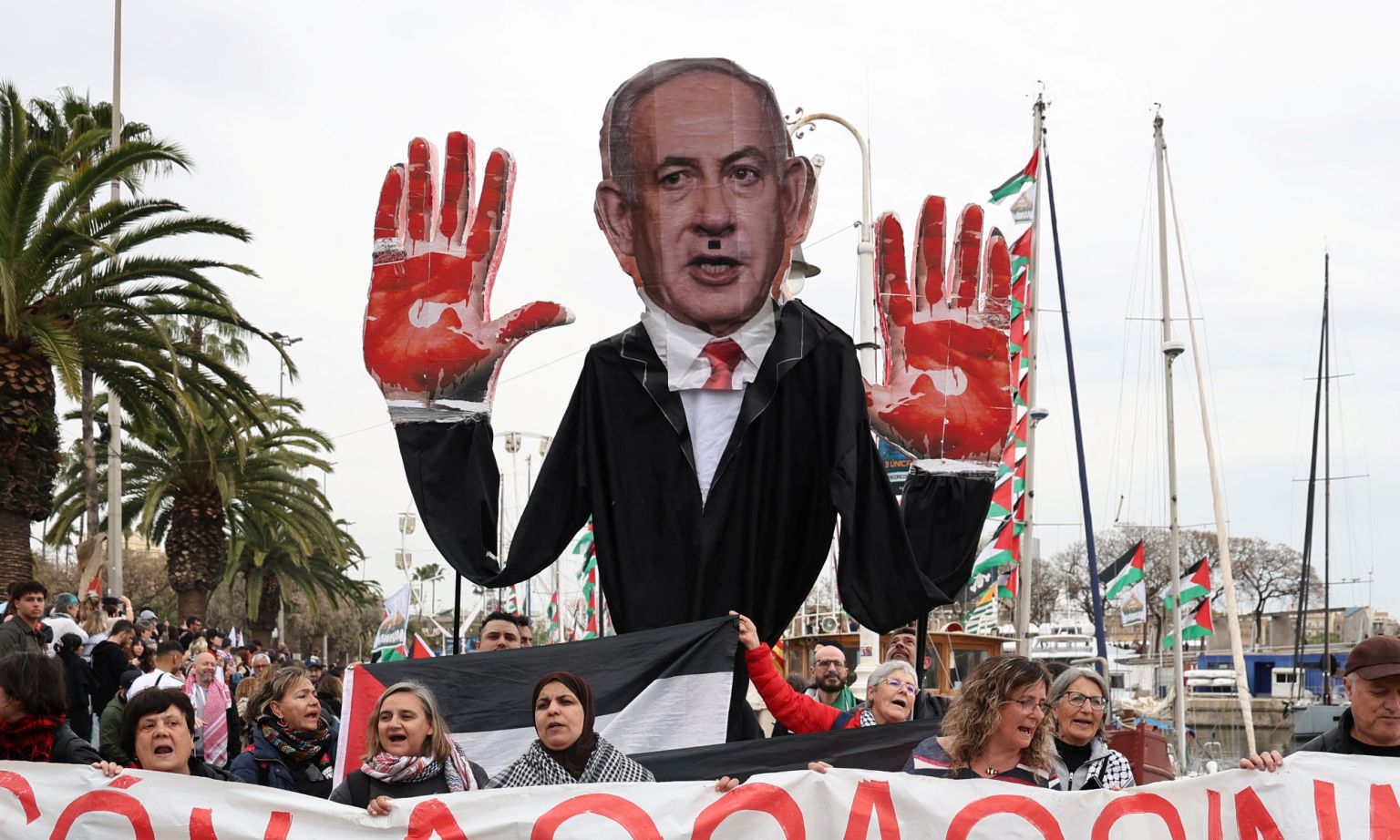 Anti-Israel activists with an effigy of Israeli prime minister Benjamin Netanyahu mocked up as Adolf Hitler with blood on his hands, Barcelona, 12 April 2026.