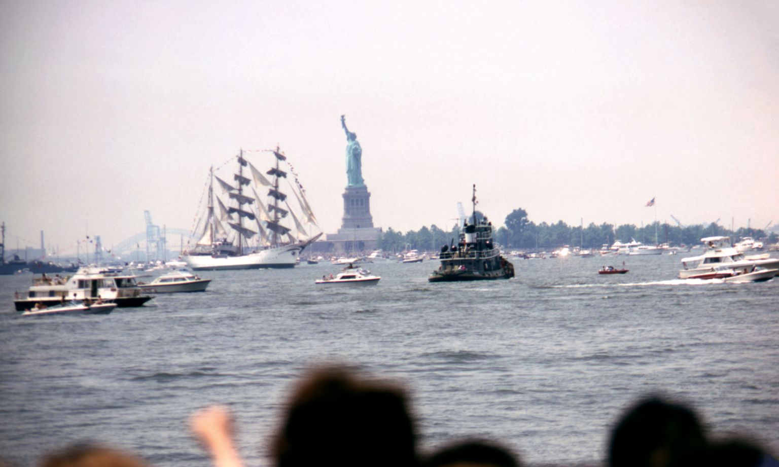 A parade of Tall Ships from 14 nations celebrate the US Bicentennial in New York Harbor, 4 July 1976. 