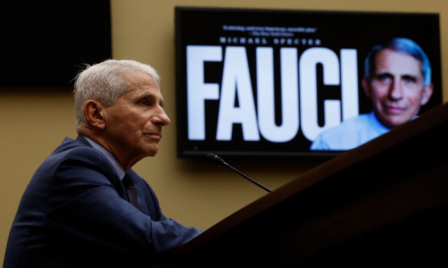 Anthony Fauci at a Senate hearing in Washington, DC, 3 June 2024. A promotional image for the 2021 documentary, Fauci, can be seen in the background.